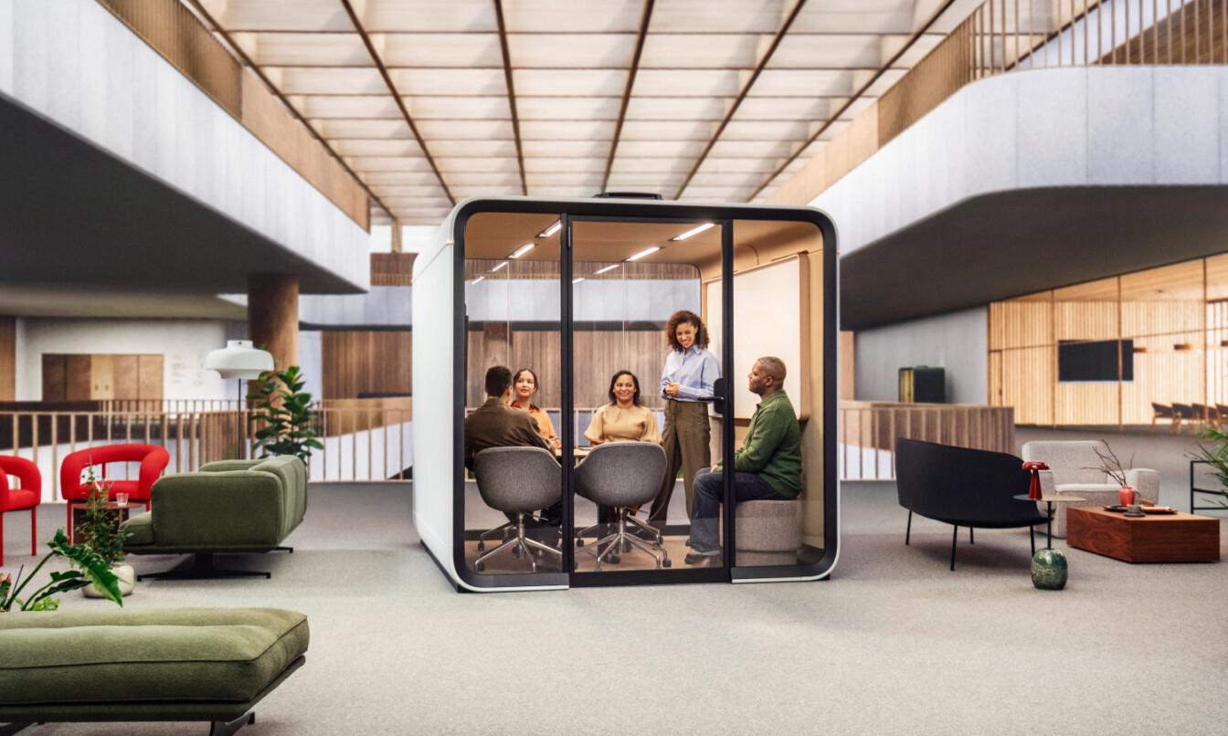 People working in soundproof meeting pod Framery Six